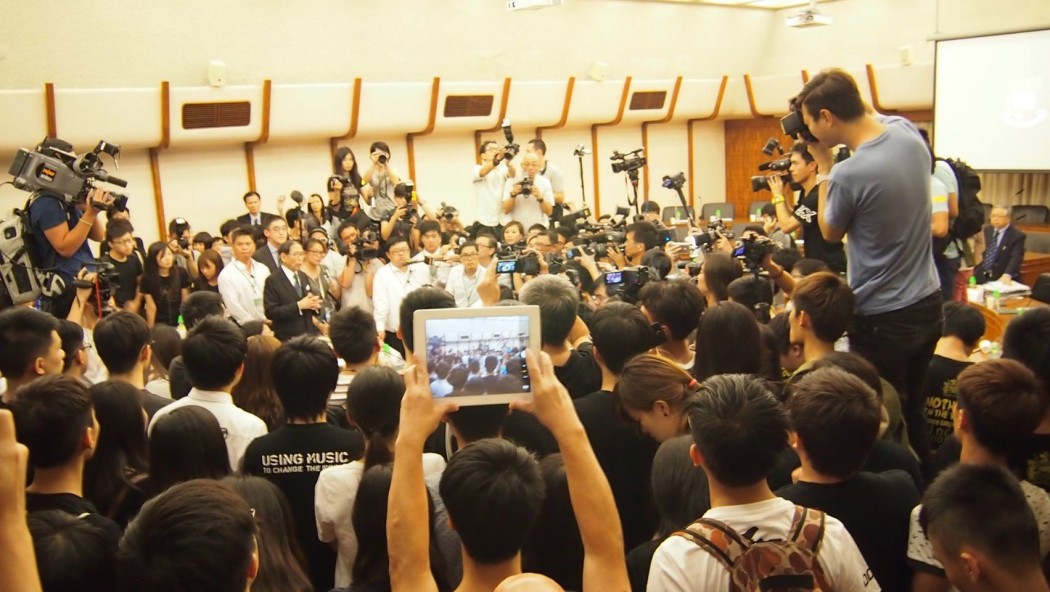 Students occupy HKU Council meeting.