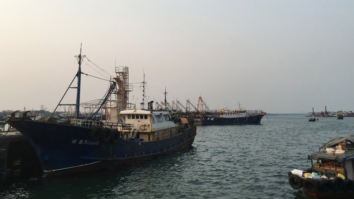 Fishing boats are seen at a harbour in Baimajing, Hainan province