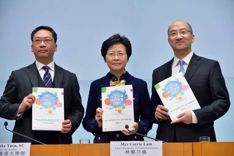 (left to right) Rimsky Yuen, Carrie Lam, and Raymond Tam. File Photo: Gov HK.