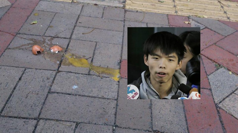 Joshua Wong was hit by eggs earlier. Photo: Inmedia HK.