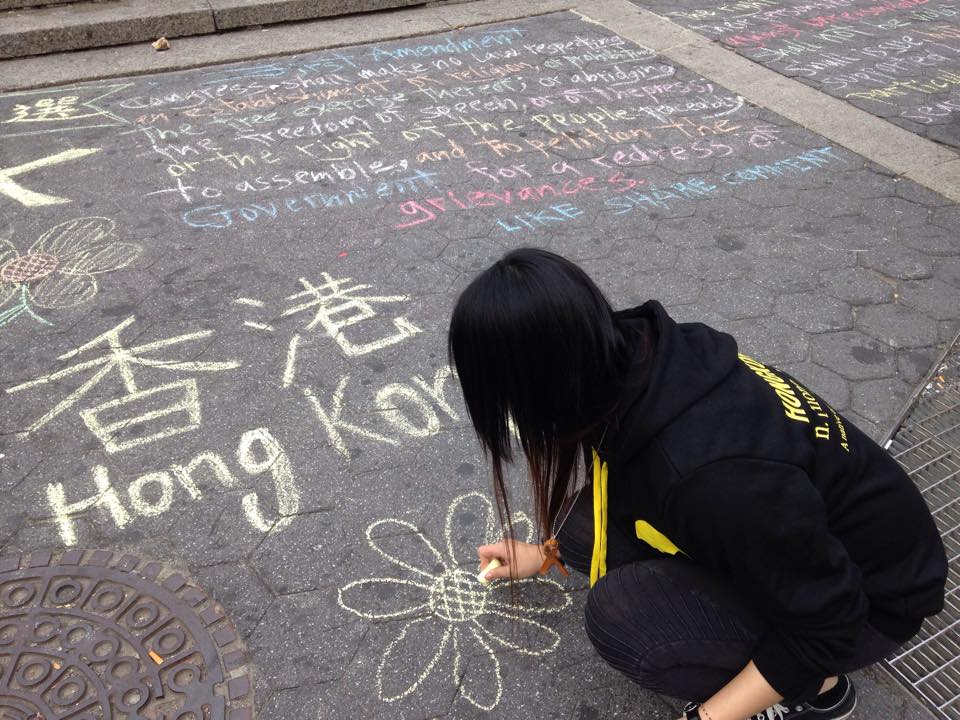 People drew symbols of the Occupy protest.