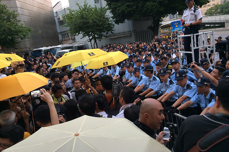 Police stand off with protesters at the Occupy anniversary commemoration.