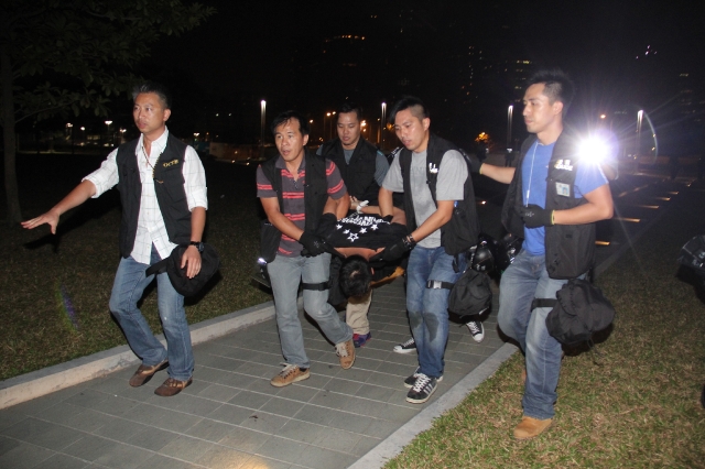 Protester Ken Tsang was moved by seven police and allegedly punched and kicked him.
