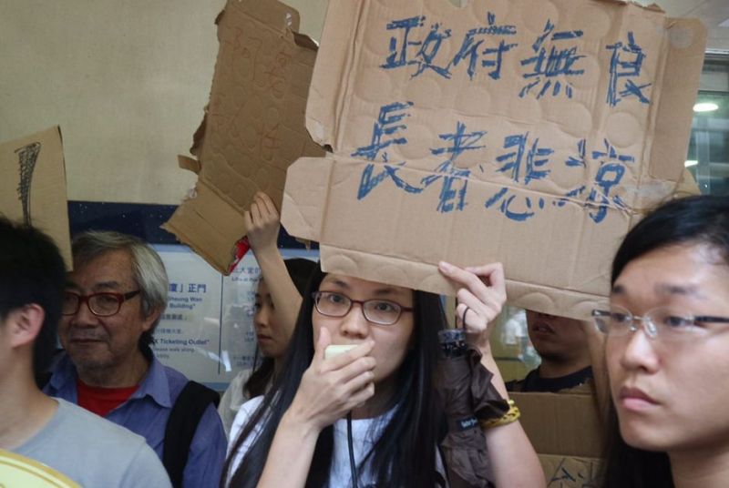 cardboard lady protest