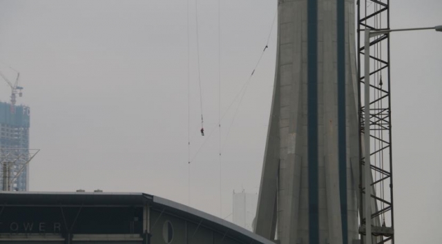 Man left dangling 55 metres off the ground at Macau Tower in bungee ...