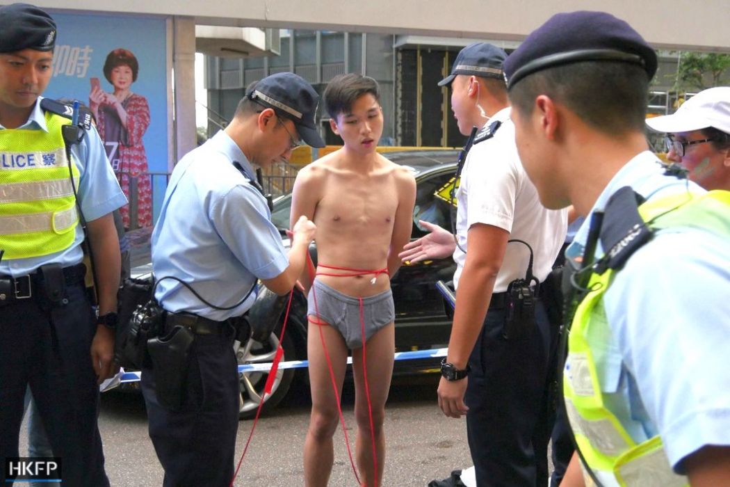 Police arrest 21-year-old 'performance artist' who stripped off a...