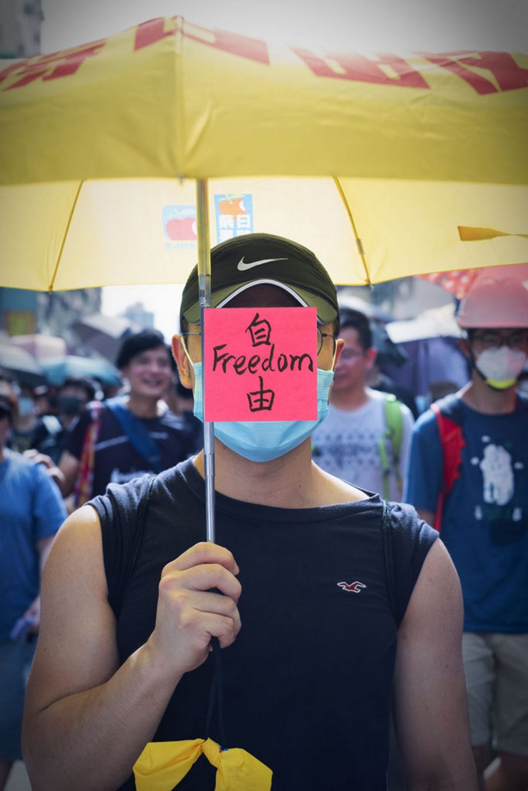 Hong Kong protesters movement without face sticker notes