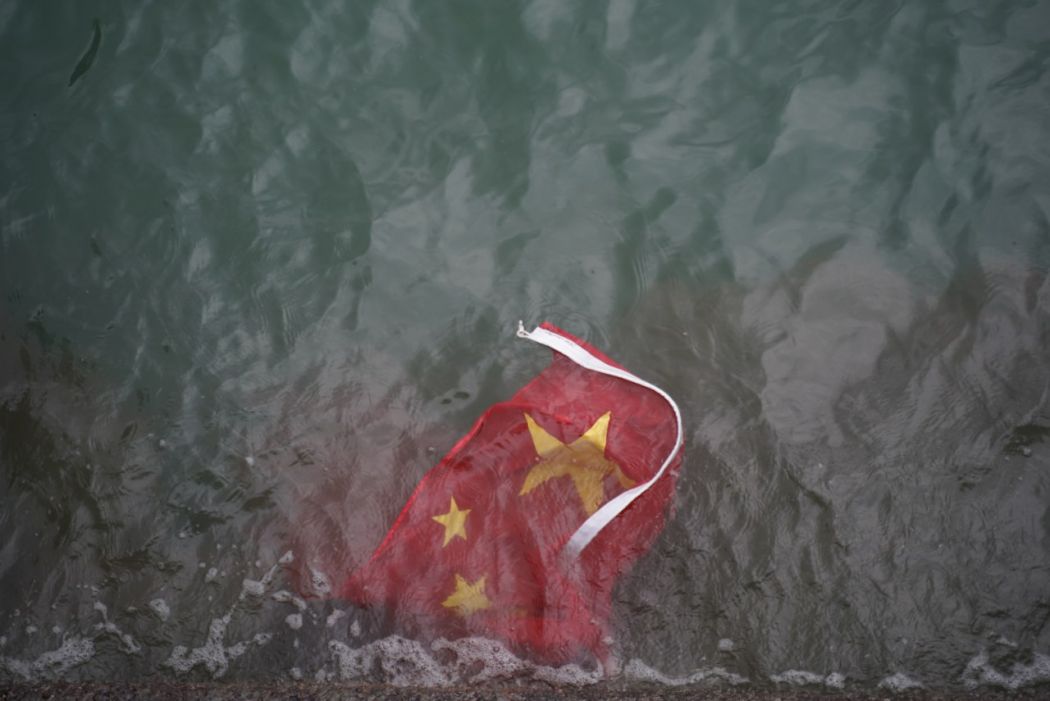 China flag sea Chinese Harbour city extradition bill government