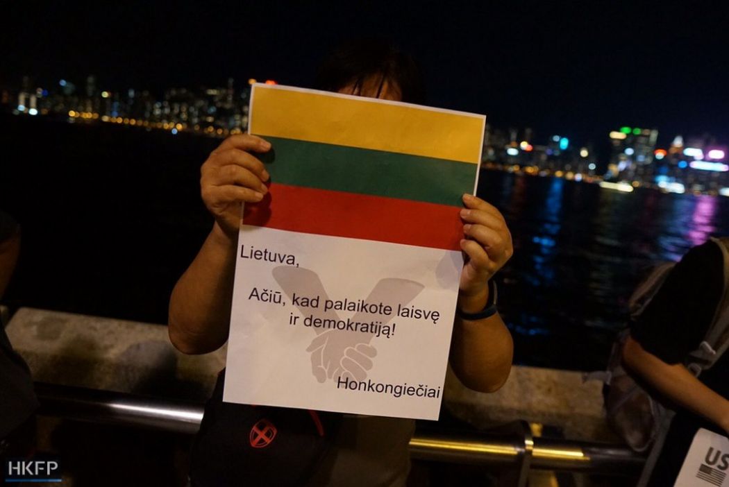 A demonstrator in his 60s, who prefers to stay anonymous because of business in mainland China, held a poster in Lithuanian. He said he went to protests whenever he has time. “I studied the whole story [of the Baltic Chain] before coming. During the last protest at Victoria Park, we have already thought about the idea, and we want to make the chain happen,” he said. “We want to show we are peaceful and united. We have different views during the movement, but we have a common goal.”