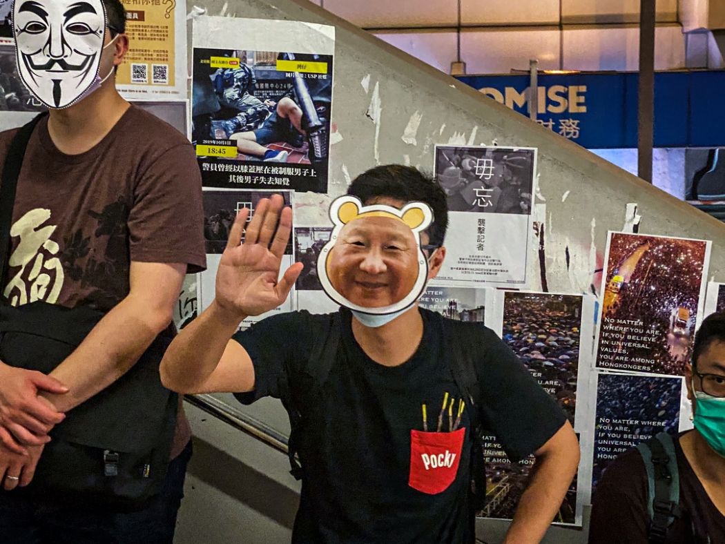 October 18 human chain mask ban china extradition