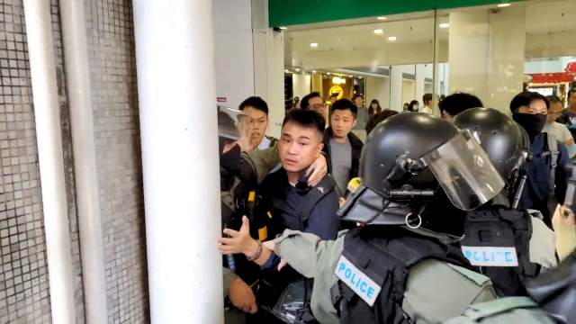 plainclothes police officer Tai Po