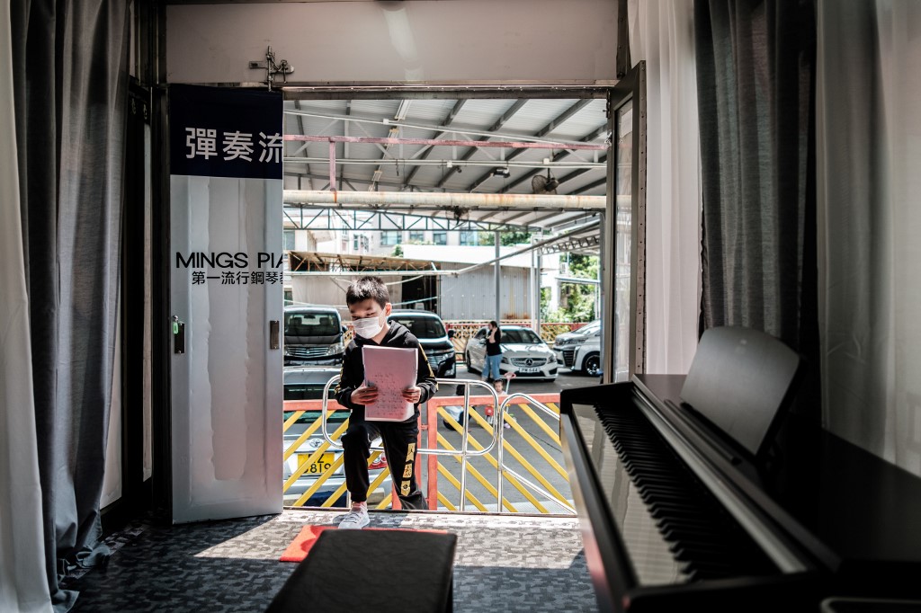 Hong Kong coronavirus virus piano lesson mobile