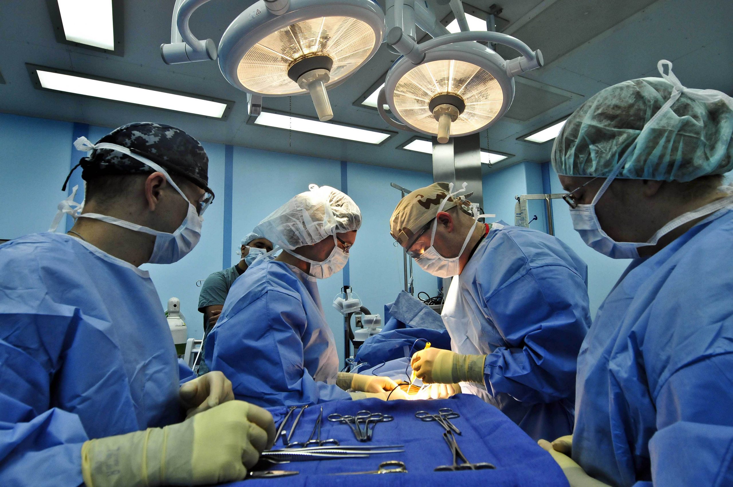 Doctors perform surgery medicine hospital