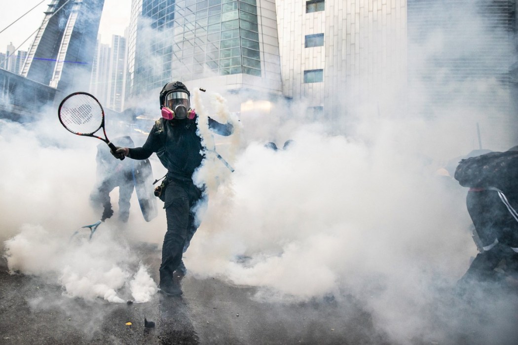 protest tear gas tennis racket "August 24, 2019"