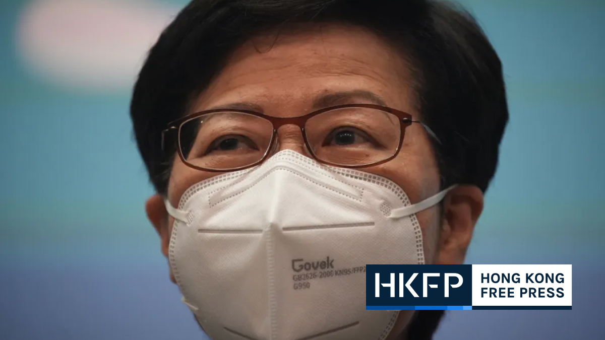 Hong Kong’s status has been undermined by Covid curbs, leader Carrie Lam says