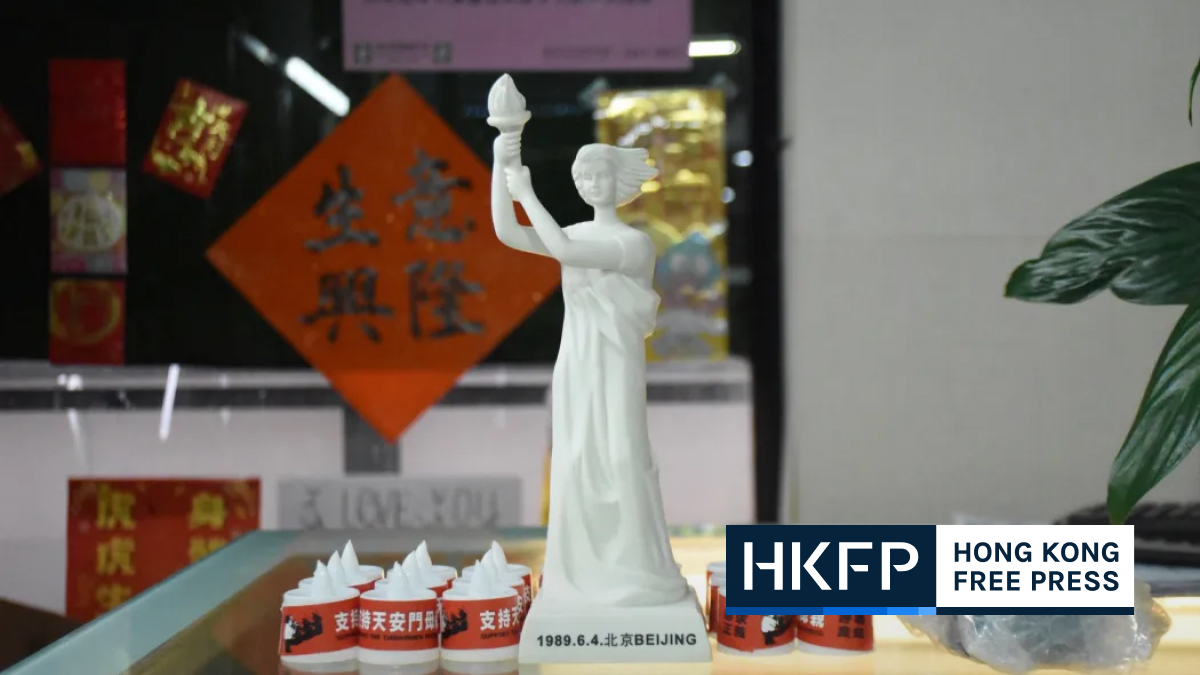 Hong Kong ex-district councillor gives out candles on Tiananmen crackdown anniversary
