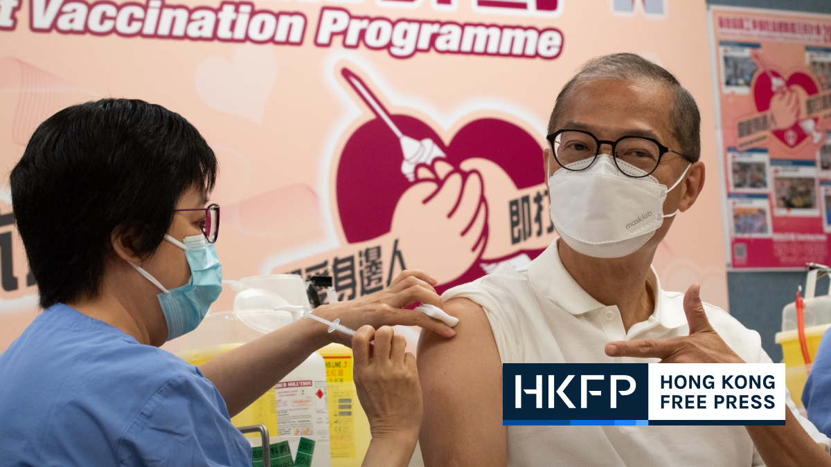 Hong Kong health chief gets Covid-19 and winter flu jabs in one sitting, urges public to follow suit