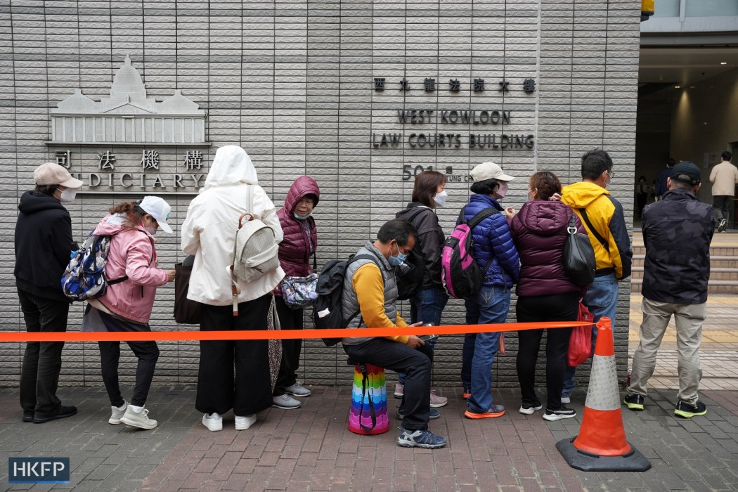 People queuing up outside the West Kowloon Law Courts Building on the second day of the national security trial of the case against 47 democrats on February 7, 2023.