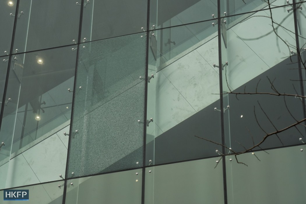 The cracked pane of glass at the West Kowloon Law Courts Building on February 9, 2023.