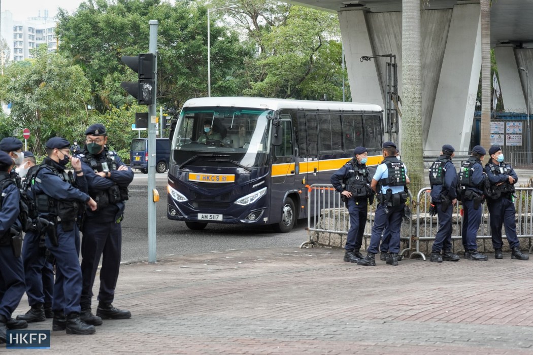 A prison van turning into the road outside the West Kowloon Law Courts Building on February 9, 2023.