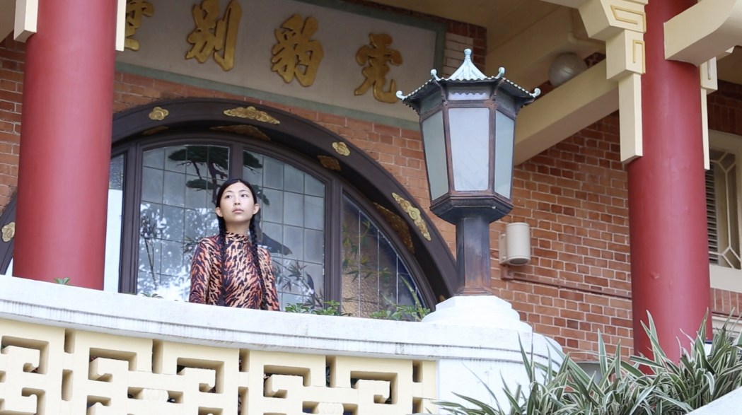 Hong Kong artist Vaevae Chan as the "tiger daughter" at Haw Par Mansion in a still image from the film from "She Told Me to Head to the Sea." Photo: Vaevae Chan.