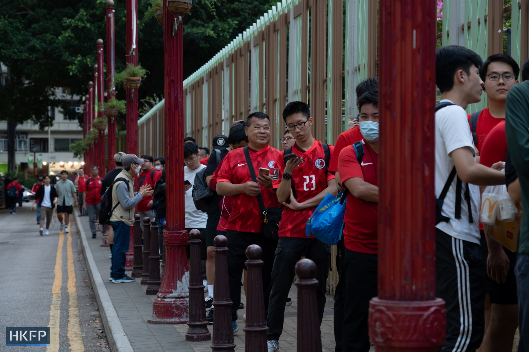 Fans queuing outside the Mong Kok Stadium for an international friendly football match between Hong Kong and Singapore on March 23, 2023.