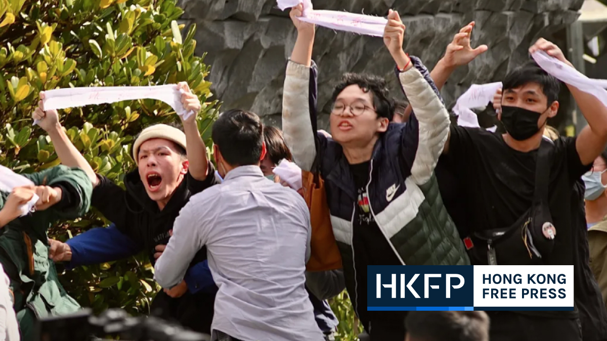 Video: ‘Kneel and apologise’ – Protesters storm stage at Taiwan massacre memorial demanding apology