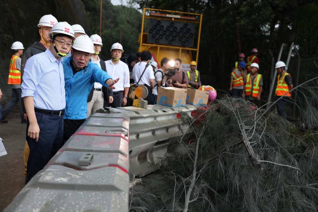 Chief Executive John Lee assesses the damage caused by landslides on Shek O Road, Hong Kong, on September 9, 2023. Photo: John Lee/Facebook.