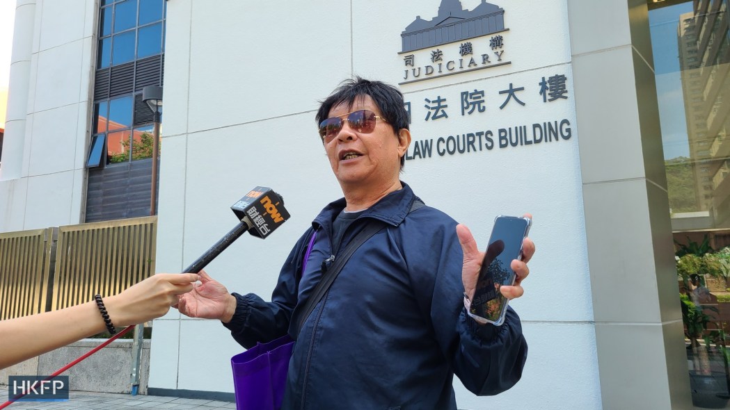 Li Jiexin is interviewed by the press outside the Shatin Magistrates’ Courts on October 24, 2023. Photo: James Lee/HKFP.