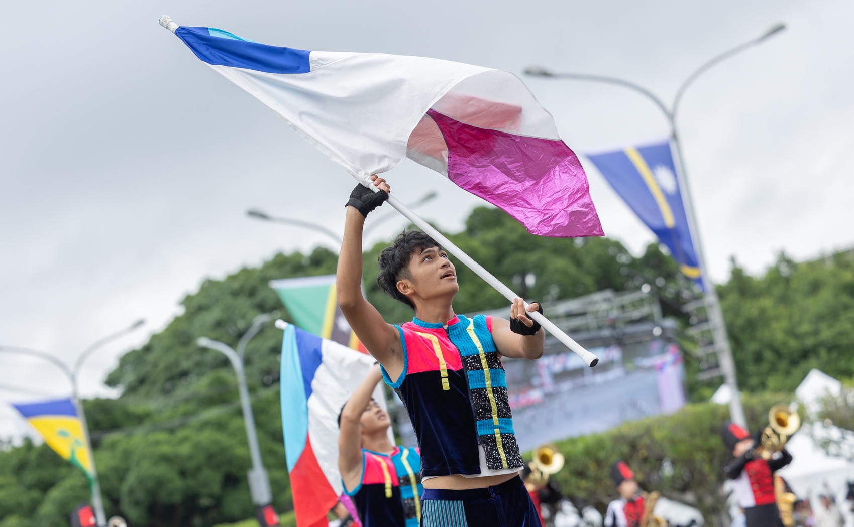 Performer waves a flag while performing in the ceremony of Taiwan National Day on October 10, 2023. Photo: Wang Yu Ching/Office of the President, via Flickr CC2.0.
