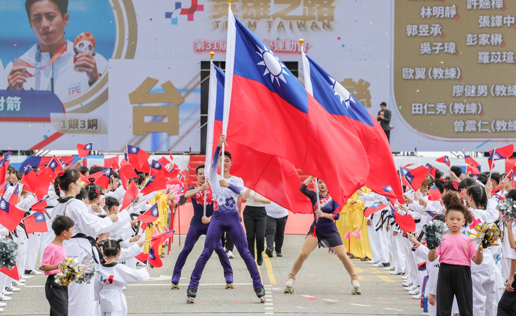 Performers hold giant Taiwan flag during the ceremony of Taiwan National Day on October 10, 2023. Photo: Wang Yu Ching/Office of the President, via Flickr CC2.0.