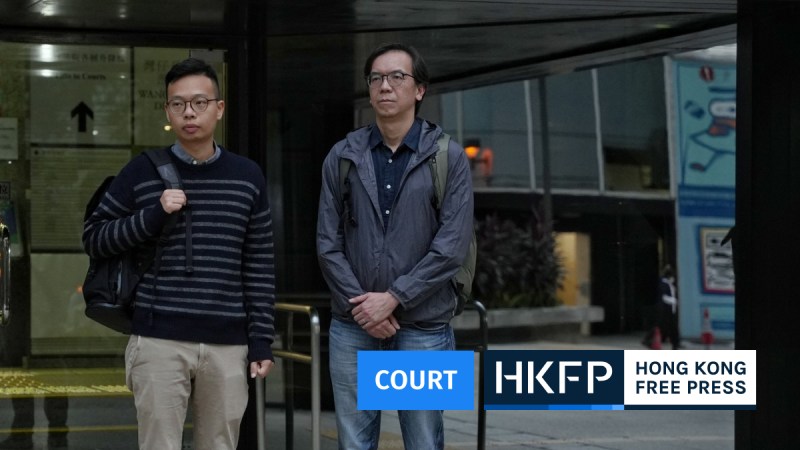 Stand News editors Patrick Lam (left) and Chung Pui-kuen outside District Court on November 15, 2023. Photo: Kyle Lam/HKFP.