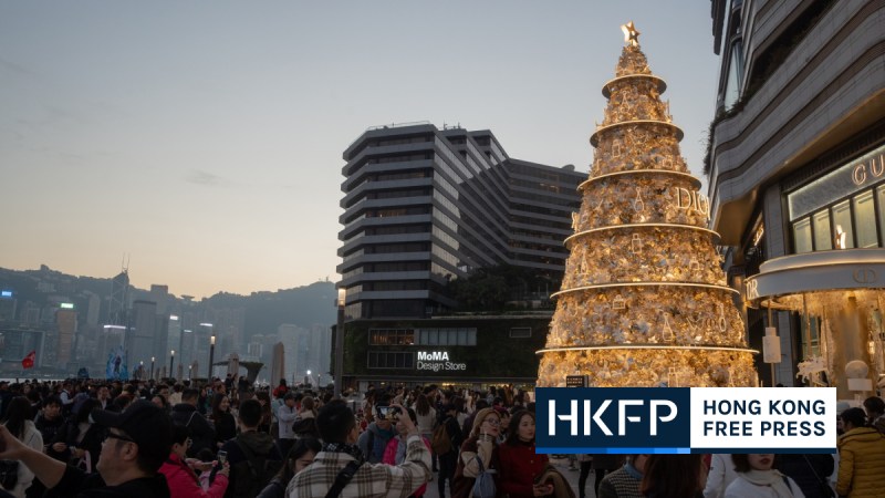People come out to see Christmas decorations in Tsim Sha Tsui, Hong Kong, on October 21, 2023. Photo: Kyle Lam/HKFP.