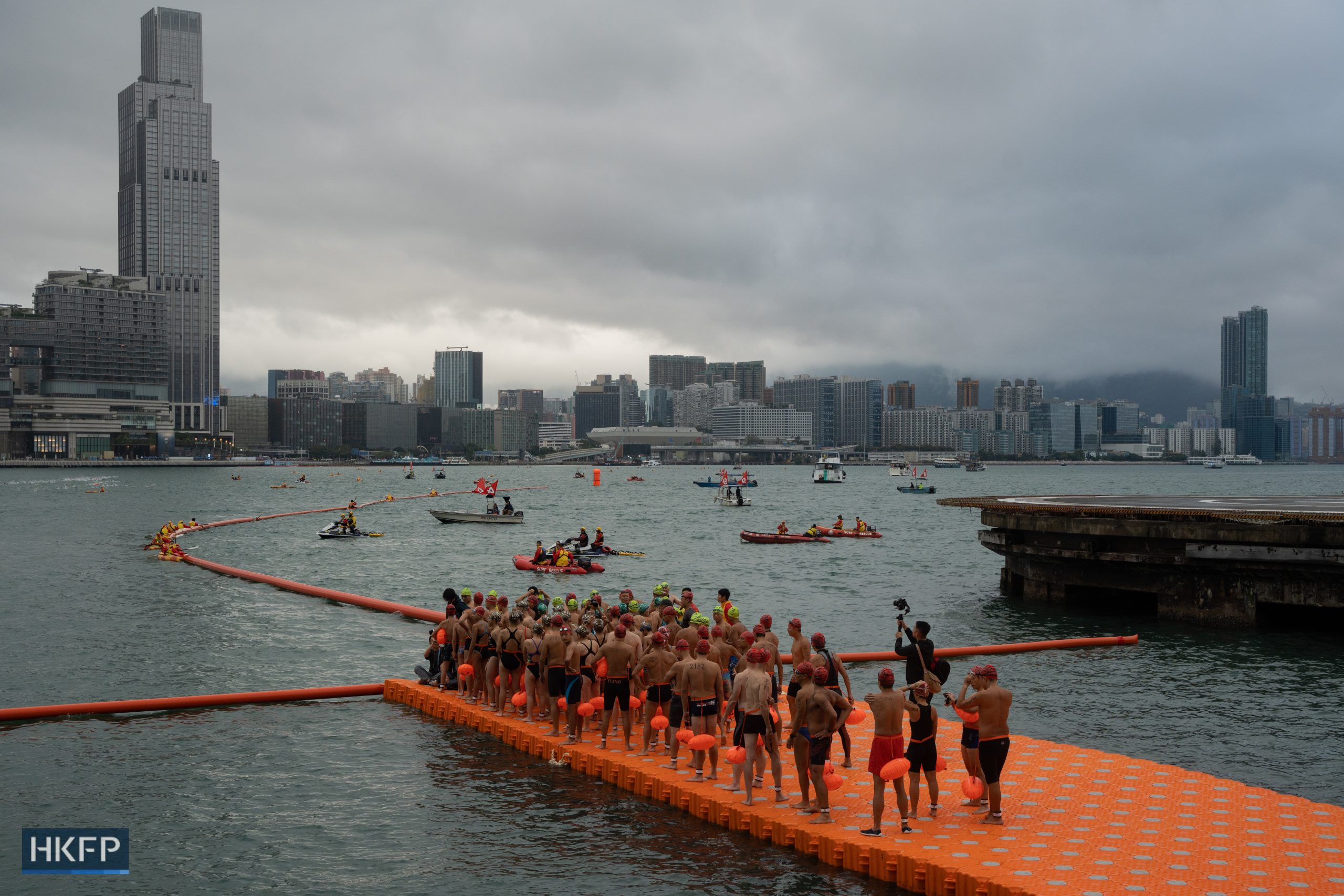 Swimmers prepare to race across the harbour on November 12, 2022. Photo: Kyle Lam/HKFP.