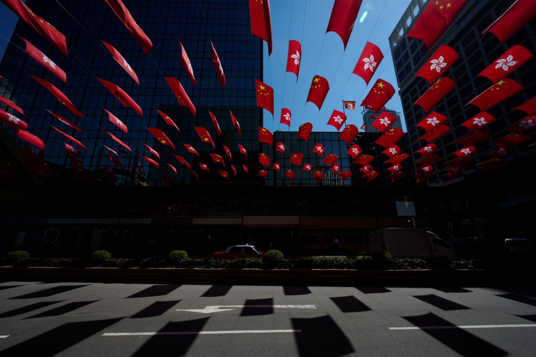 National flags of China and HKSAR flags in Hong Kong. File photo: GovHK.