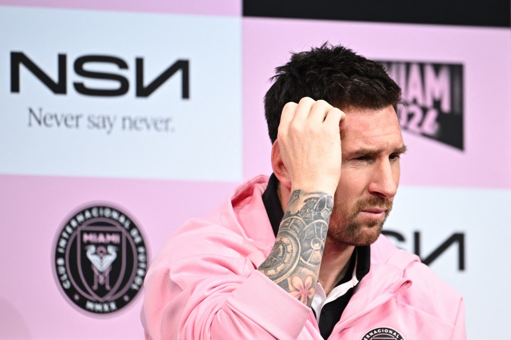Inter Miami's Argentine forward Lionel Messi reacts after taking a question about his team's previous match in Hong Kong, during a press conference at a hotel in Tokyo on February 6, 2024, a day before their friendly football match against J-League side Vissel Kobe. Photo: Philip Fong/AFP.