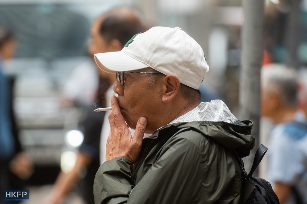 A man smokes in Hong Kong, on October 20, 2023. Photo: Kyle Lam/HKFP.