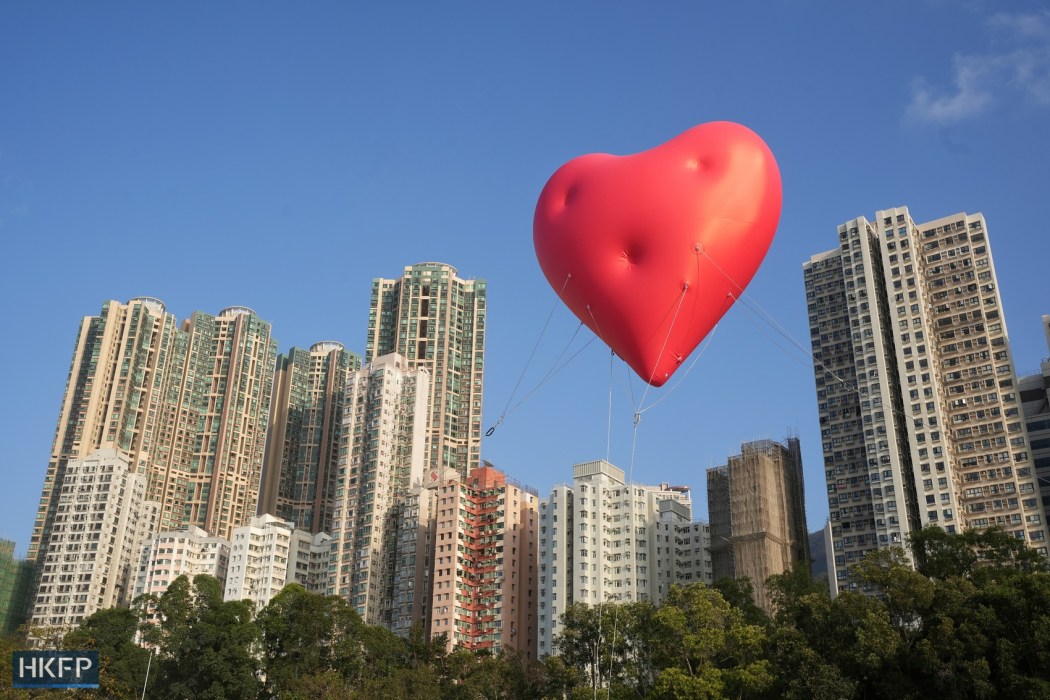 A Chubby Hearts balloon pops up in Kennedy Town on February 14, 2024. Photo: Kyle Lam/HKFP.