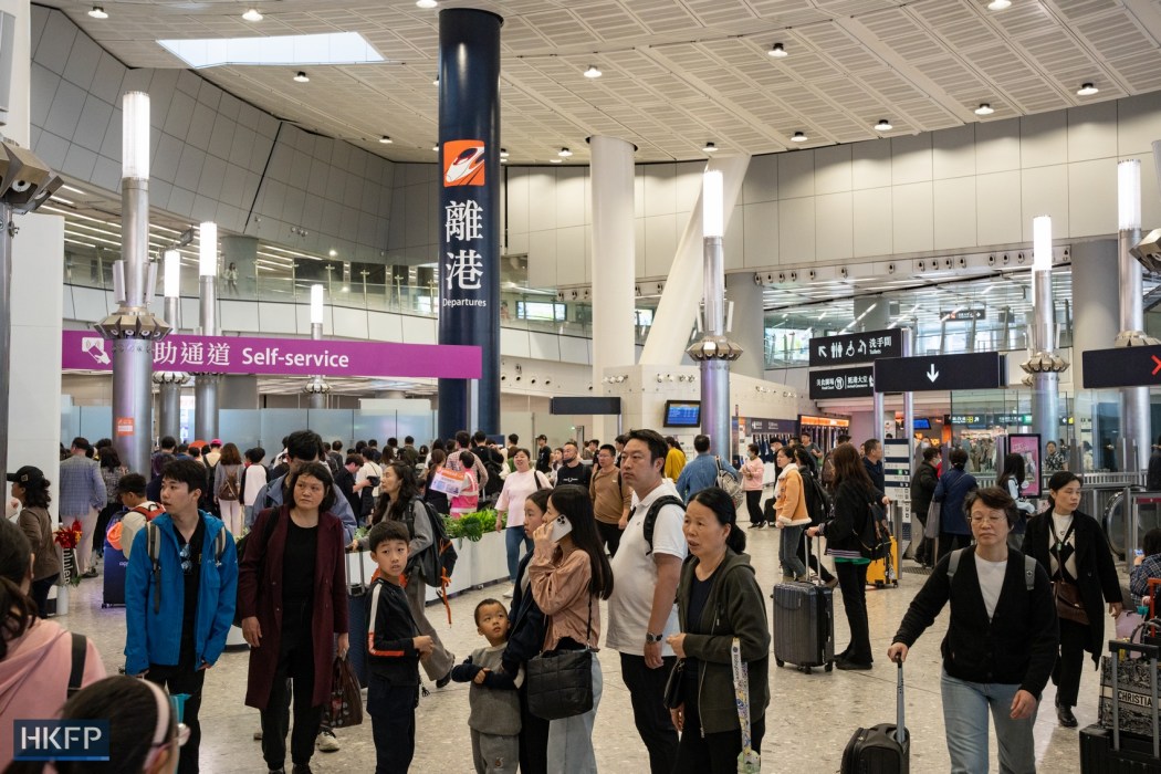 People at West Kowloon Station, in Hong Kong, on February 15, 2024. Photo: Kyle Lam/HKFP.