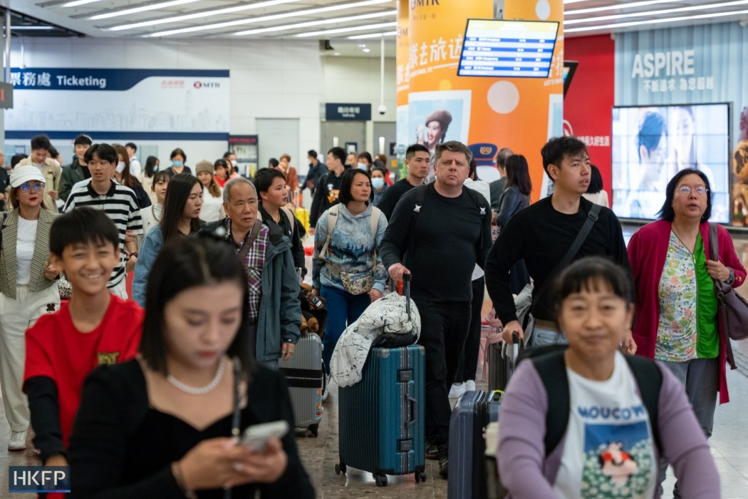 Visitors in the Hong Kong West Kowloon Station on February 15, 2024. Photo: Kyle Lam/HKFP.