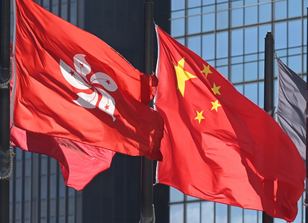 A Chinese national flag and a HKSAR flag in Hong Kong. Photo: GovHK.