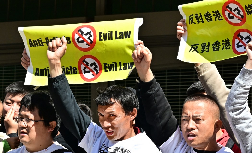 People gather to protest against Hong Kong's new national security law outside the Chinese consulate in Los Angeles