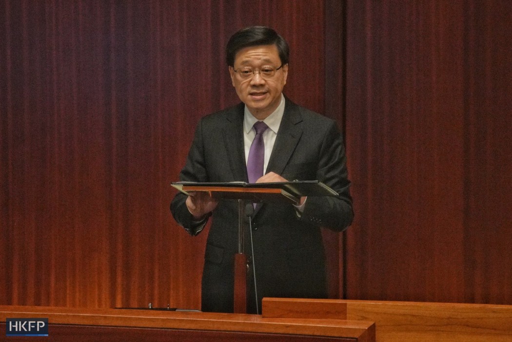 Chief Executive John Lee addresses lawmakers in the Legislative Council Chamber after a unanimous vote in favour of passing new security legislation on March 19, 2024. Photo: Kyle Lam/HKFP.