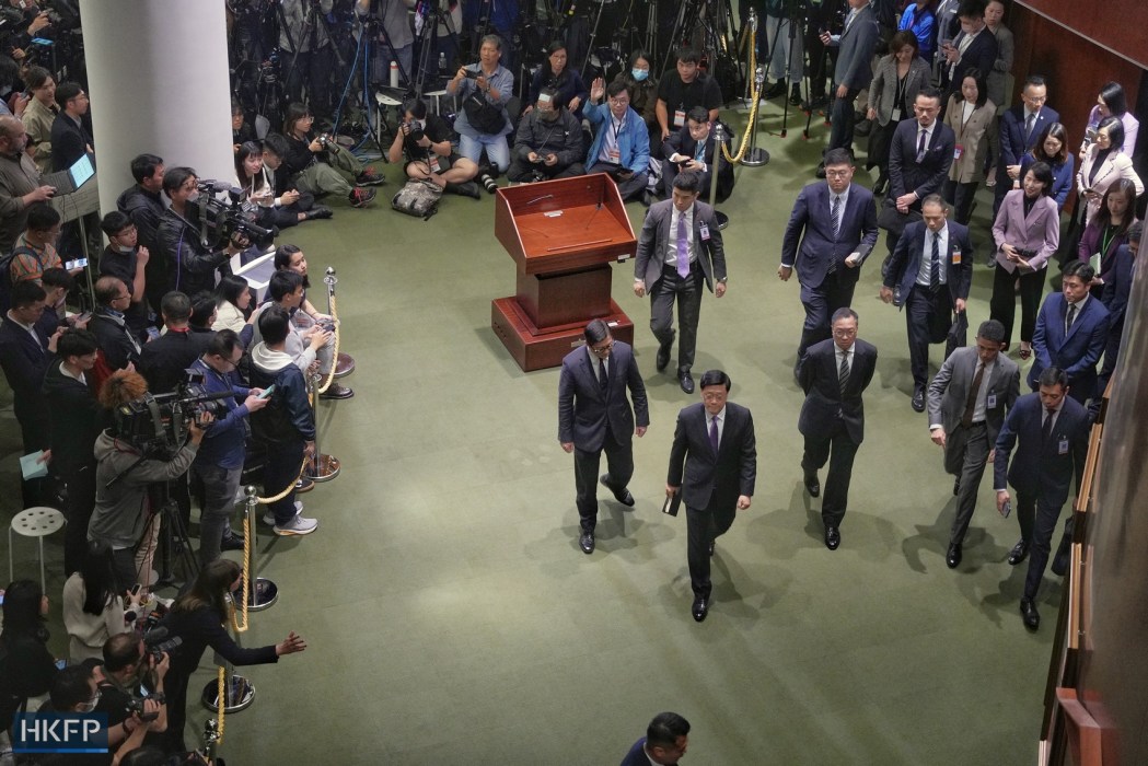 Hong Kong officials including Chief Executive John Lee and Secretary for Security Chris Tang leave the Legislative Council after the passage of Article 23 legislation on March 19, 2024. Photo: Kyle Lam/HKFP.