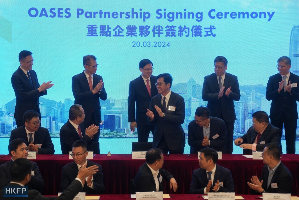 Representatives from strategic I&T enterprises sign an agreement to set up offices or expand operations in Hong Kong  on March 20, 2024. Photo: Kyle Lam/HKFP.
