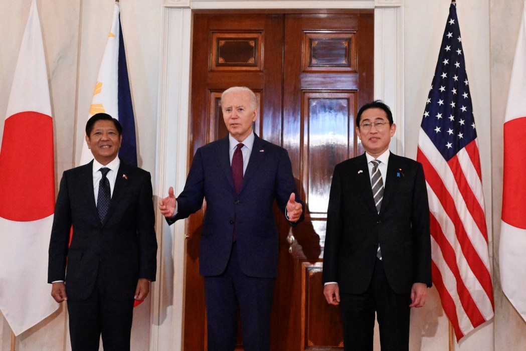 US President Joe Biden speaks to the press with Japanese Prime Minister Fumio Kishida (right) and Filipino President Ferdinand Marcos Jr. (left) at the White House in Washington, DC, April 11, 2024.