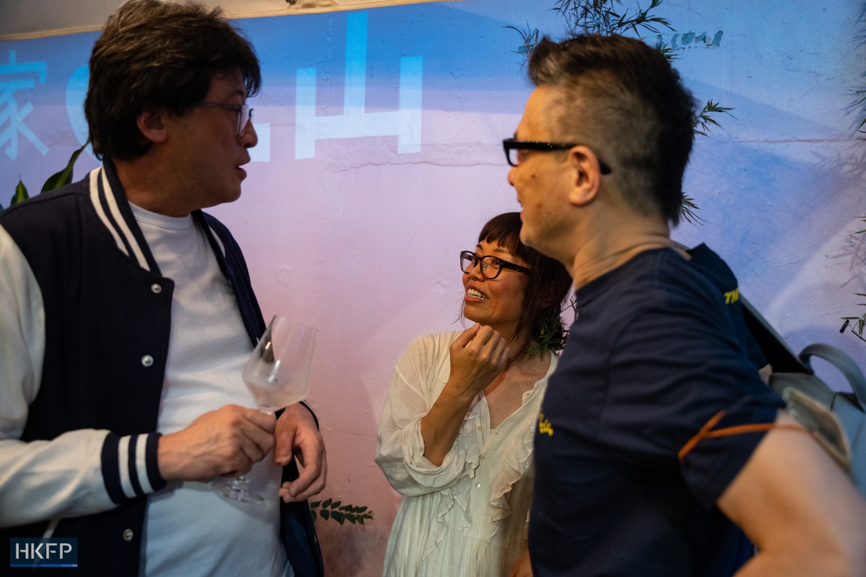 Sharon Chan (middle), founder of Hong Kong independent bookstore Mount Zero, talks to Senior Counsel Paul Shieh (left) and singer Anthony Wong (right) on March 31, 2024. Photo: Kyle Lam/HKFP.