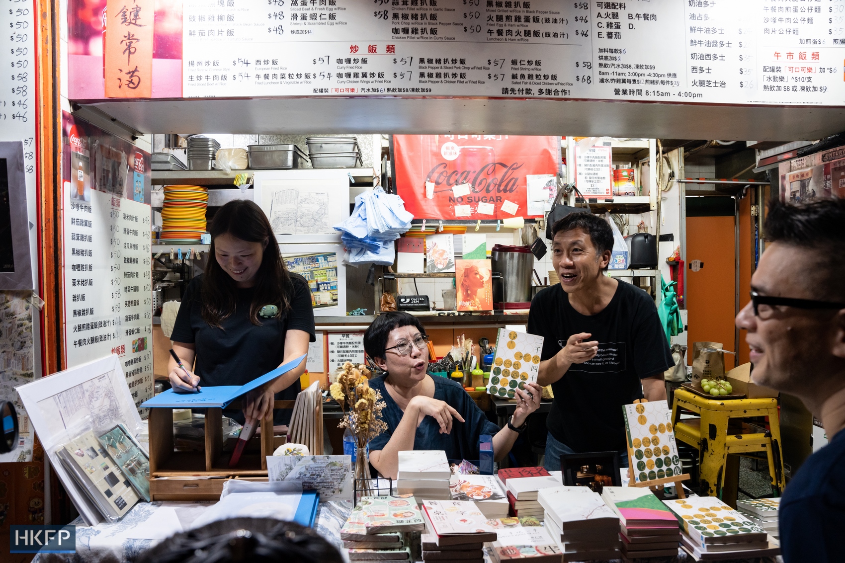 Hong Kong independent bookstore Mount Zero extends its bookstall to its neighbour, Yuk Kin Fast Food, on its last day of business on March 31, 2024. Photo: Kyle Lam/HKFP.