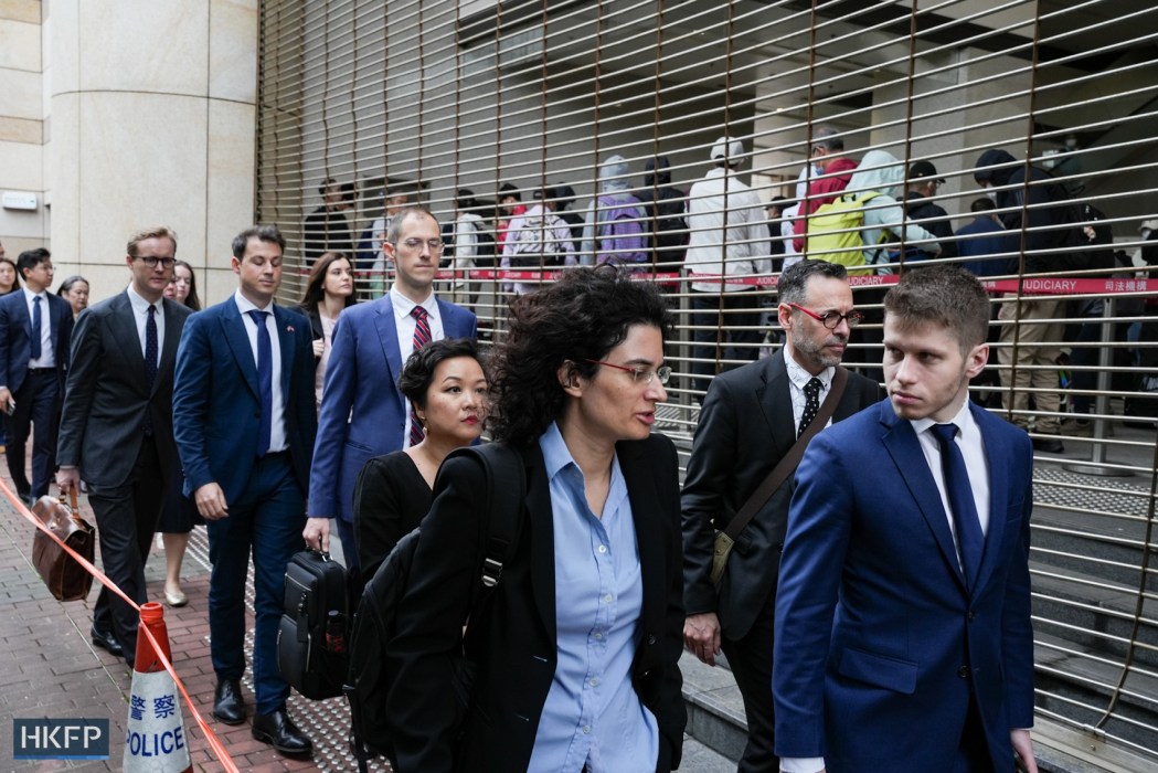 Diplomats in line outside the West Kowloon Law Courts Building ahead of the verdict hearing of 16 Hong Kong pro-democracy figures involved in the city's largest national security case, on May 30, 2024. Photo: Kelly Ho/HKFP.